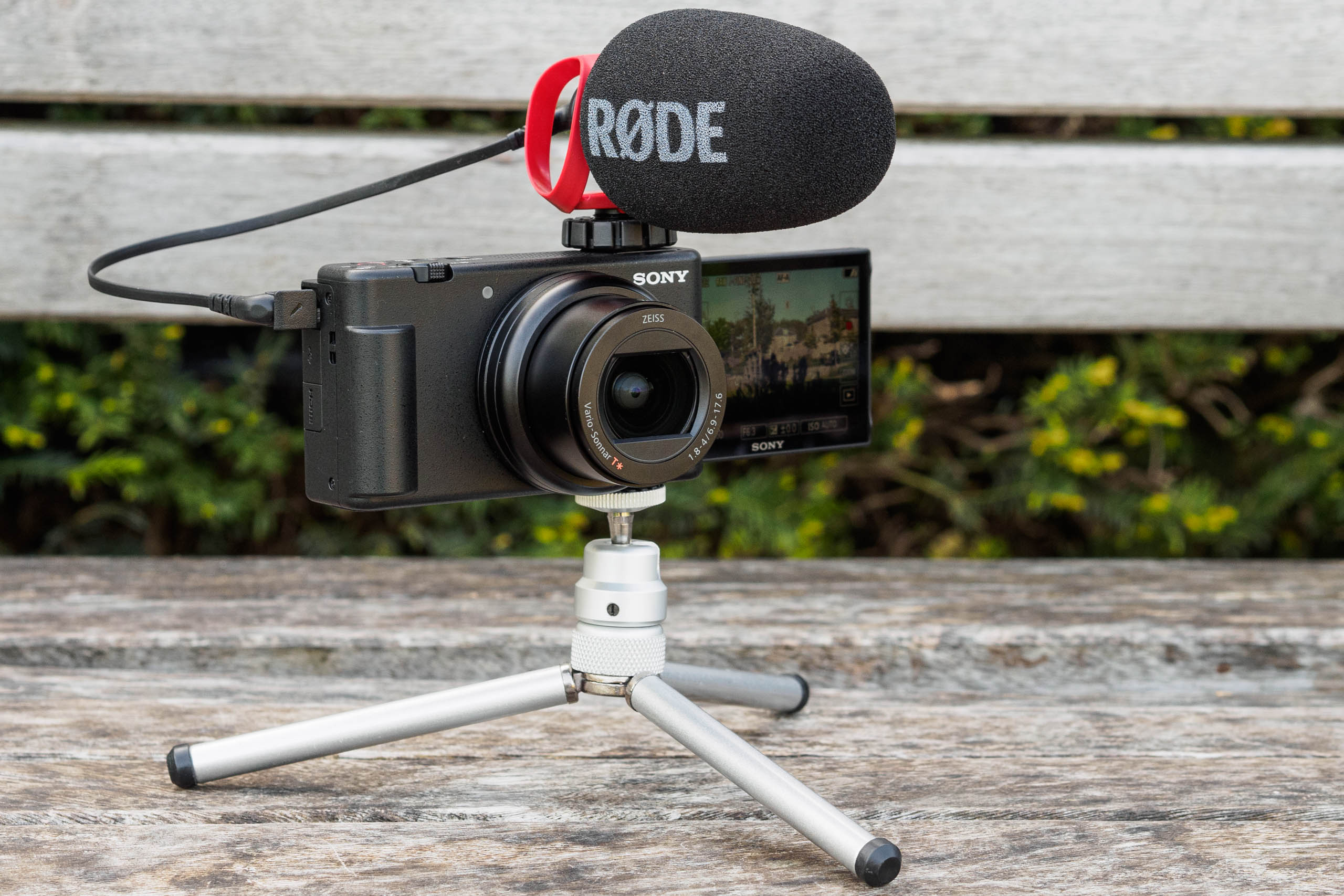 Sony ZV-1 Mark II on a tripod, with a Rode Videomicro II on board