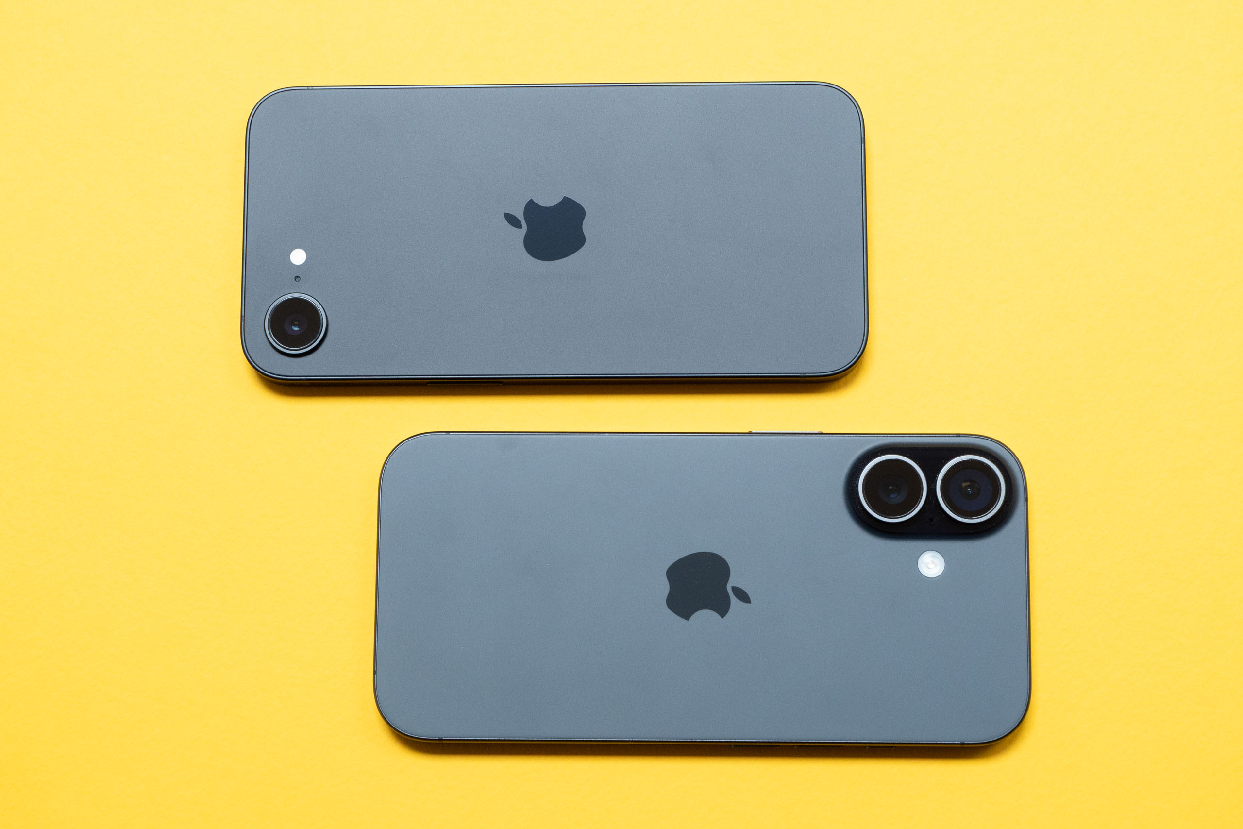 The iPhone 16e above the iPhone 17