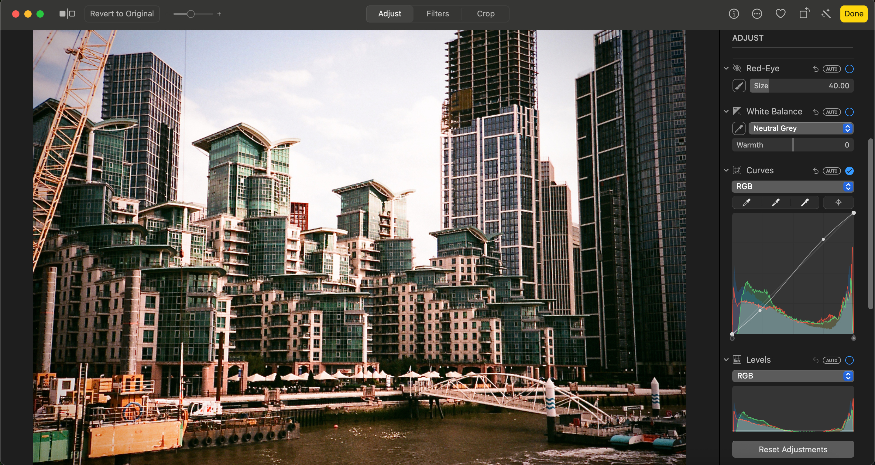 Screenshot of Apple Photos editing interface, being used to edit a cityscape photograph