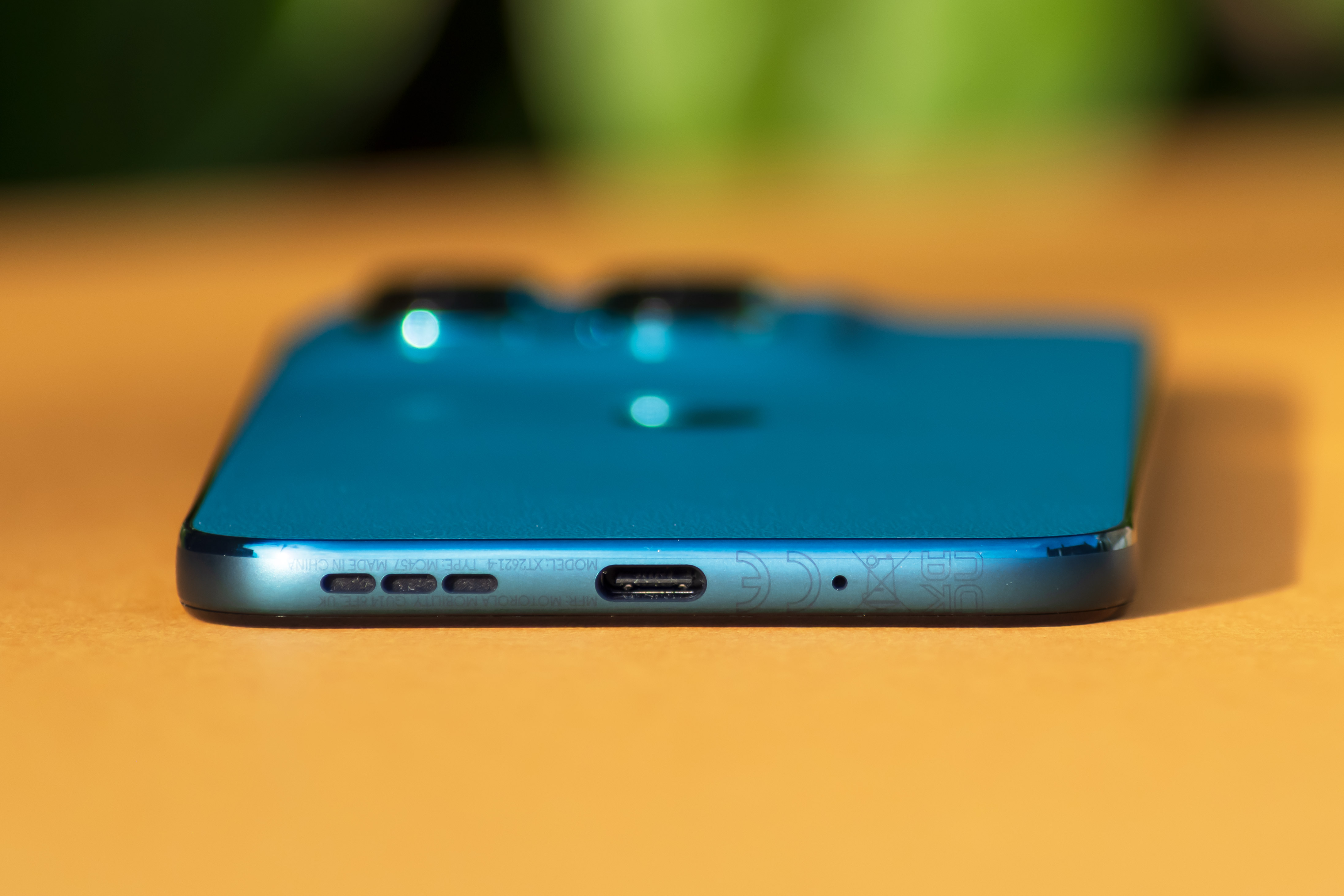 Moto G77 USB-C charging port and stereo speakers