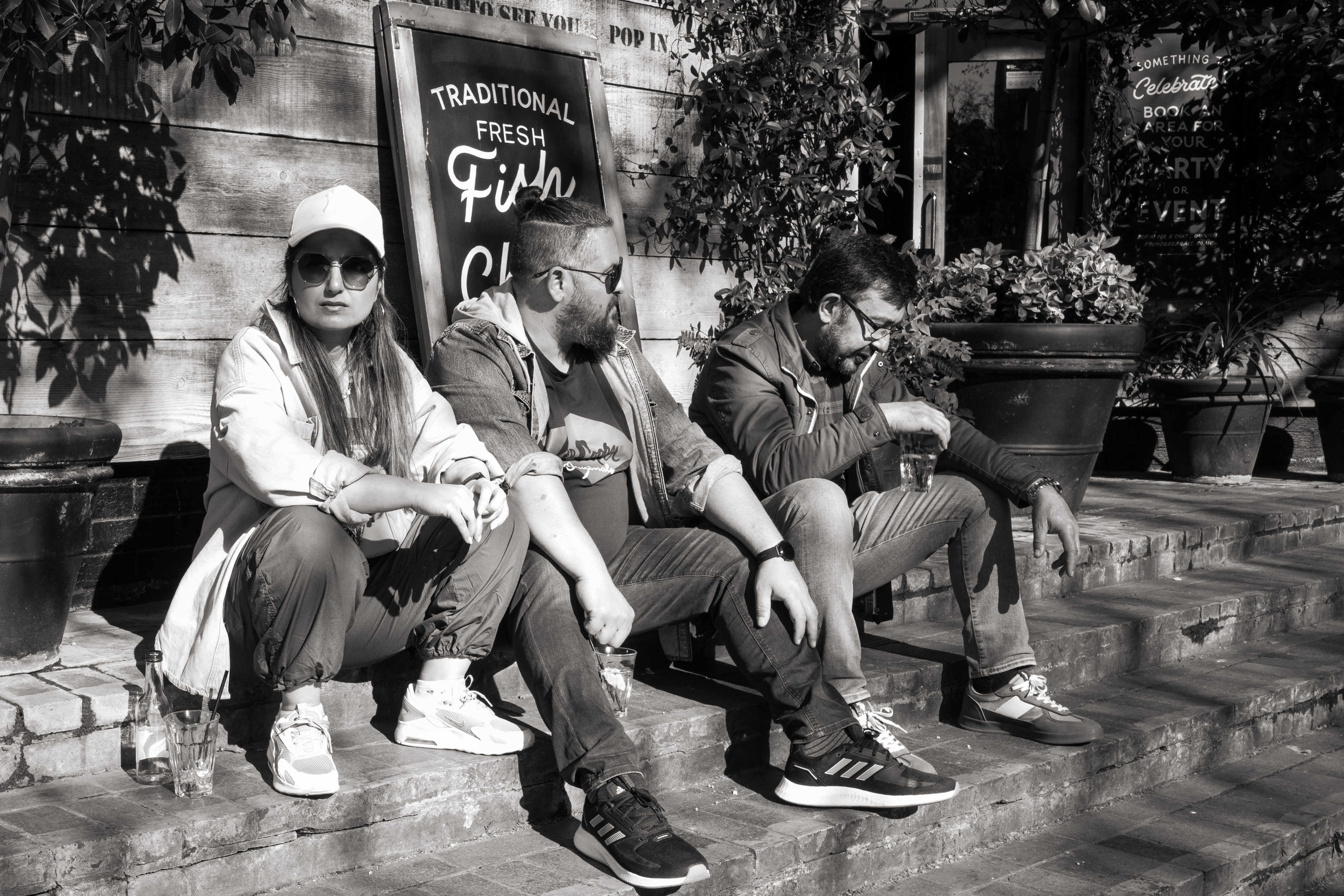 Ricoh GR IV Monochrome sample image: street photo. 